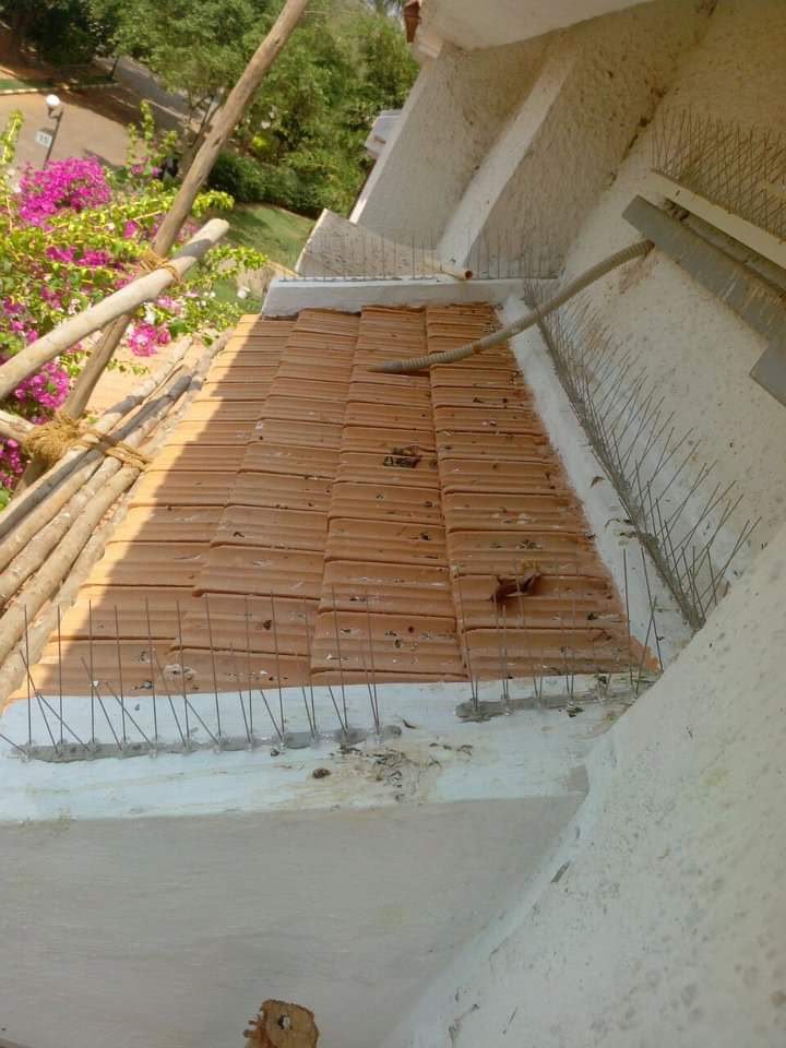 Invisible grill installation on a balcony