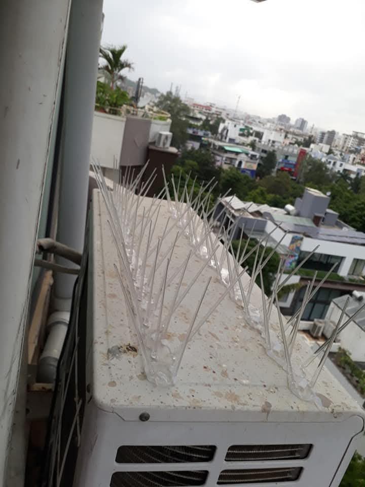Invisible grill installation on a balcony