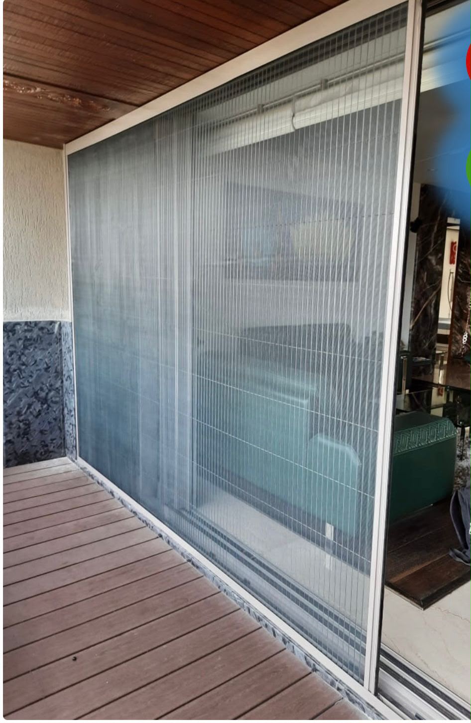 Invisible grill installation on a balcony