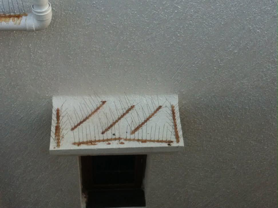 Invisible grill installation on a balcony